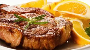 Porsaanfilee appelsiinikastikkeessa. Terveellinen resepti kotiruokaa varten.