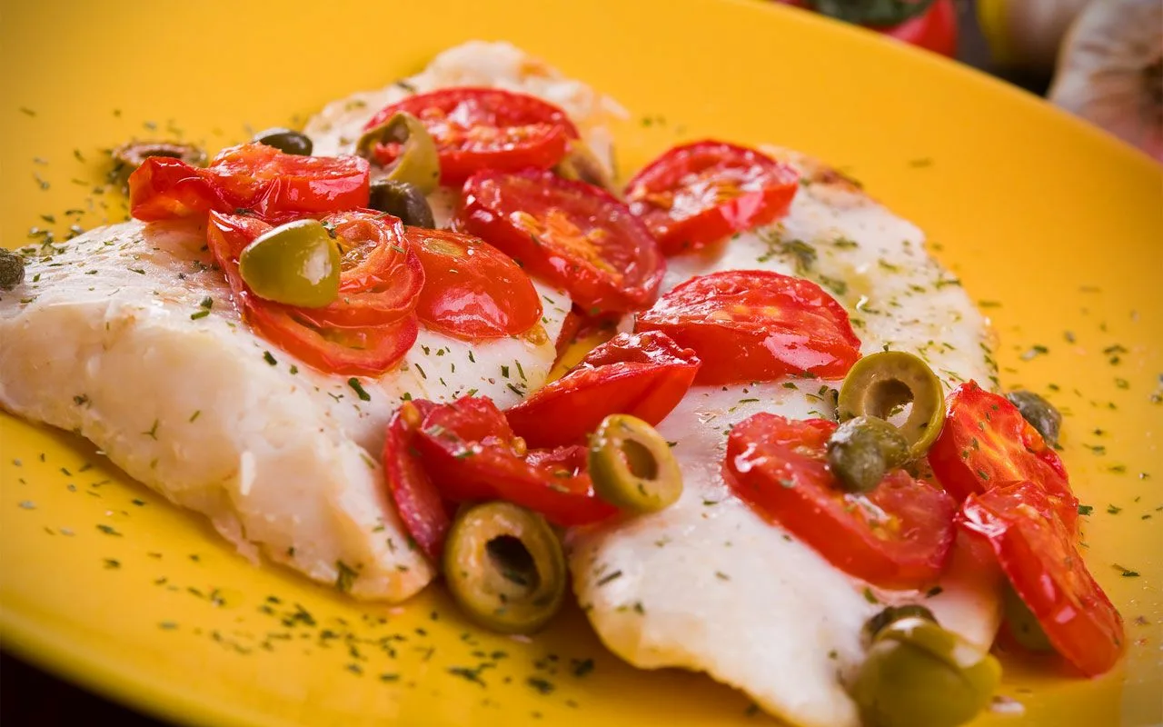 Korvaamaton ruokalaji joulupöydässä. Tämä kreikkalaistyylinen kalaresepti on kaikkein herkullisin.