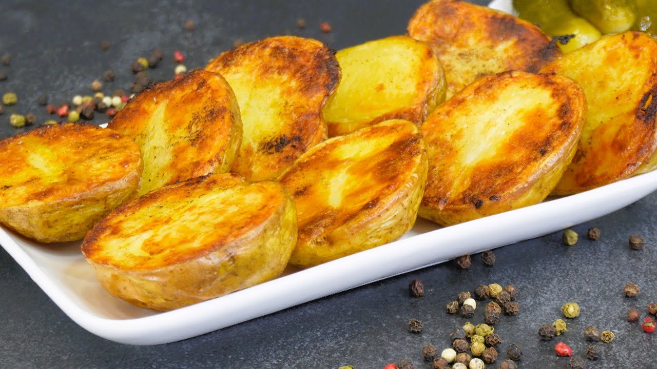 Kuinka valmistaa kultaiset ja rapeat jouluperunat, askel askeleelta.