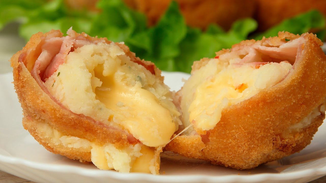 Perunapallot, jotka on täytetty perunamuusilla, kinkulla ja munalla, ovat ihastuttava jouluinen alkupala.