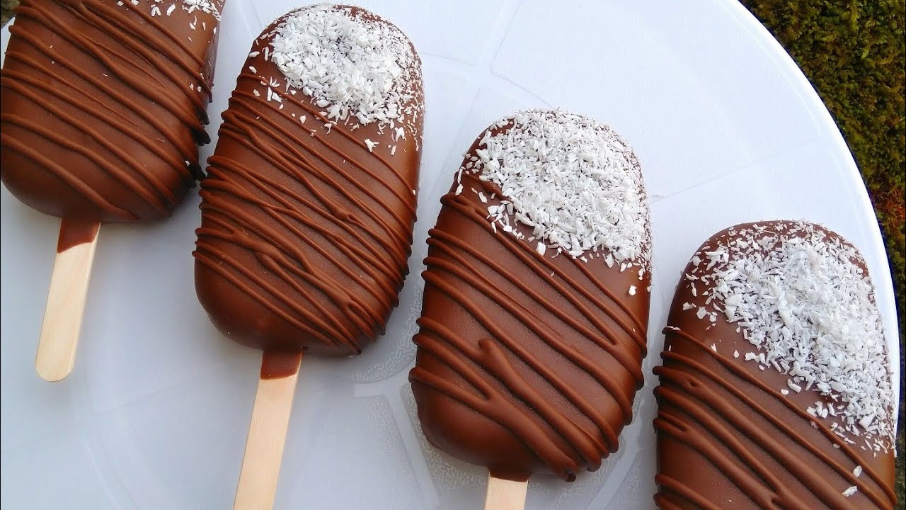Chocolate biscuit stick cakes: moist, with cream cheese frosting and crunchy chocolate glaze.