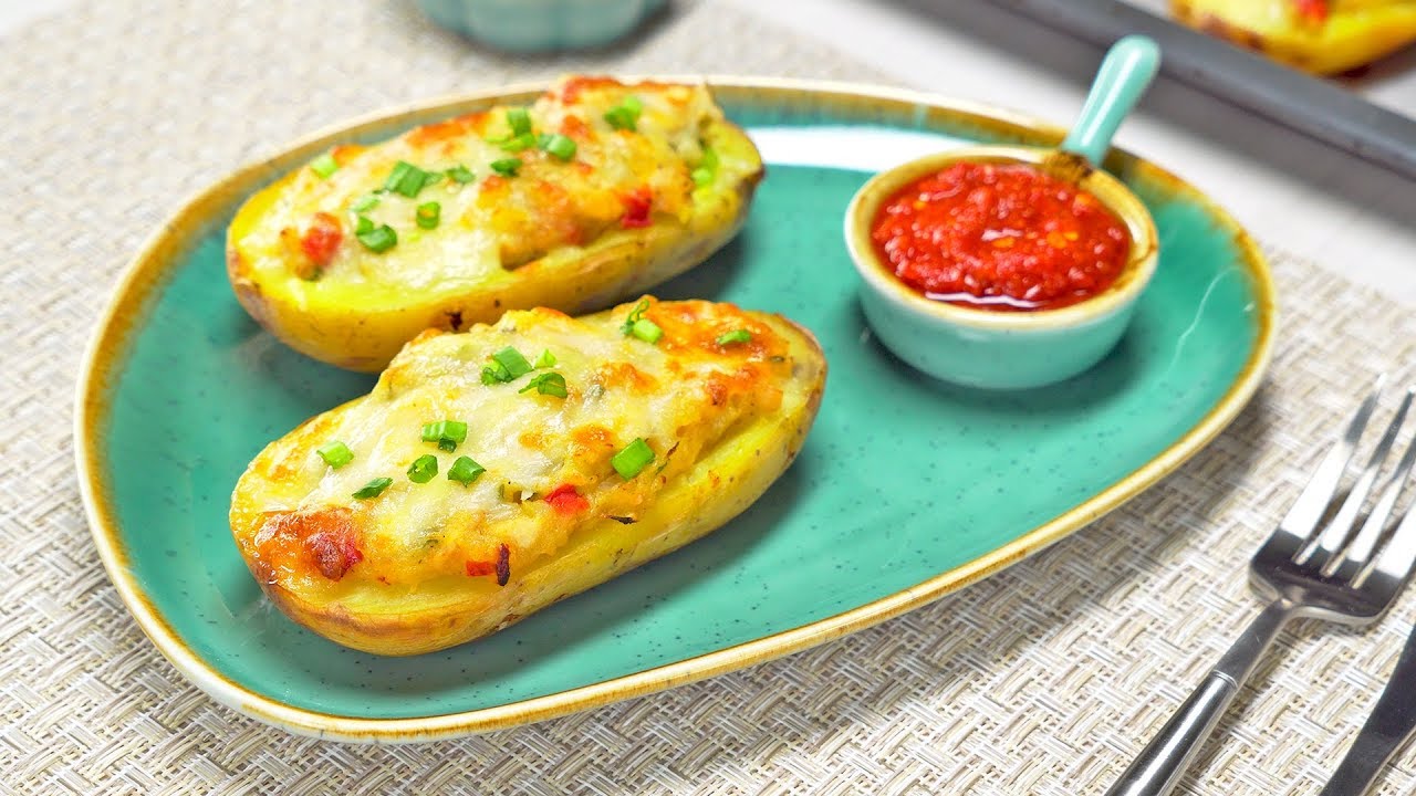 Uunissa paistettu bataatti, täytetty vihanneksilla: omaperäinen resepti, jonka makea maku sopii erinomaisesti terveelliseen illalliseen.