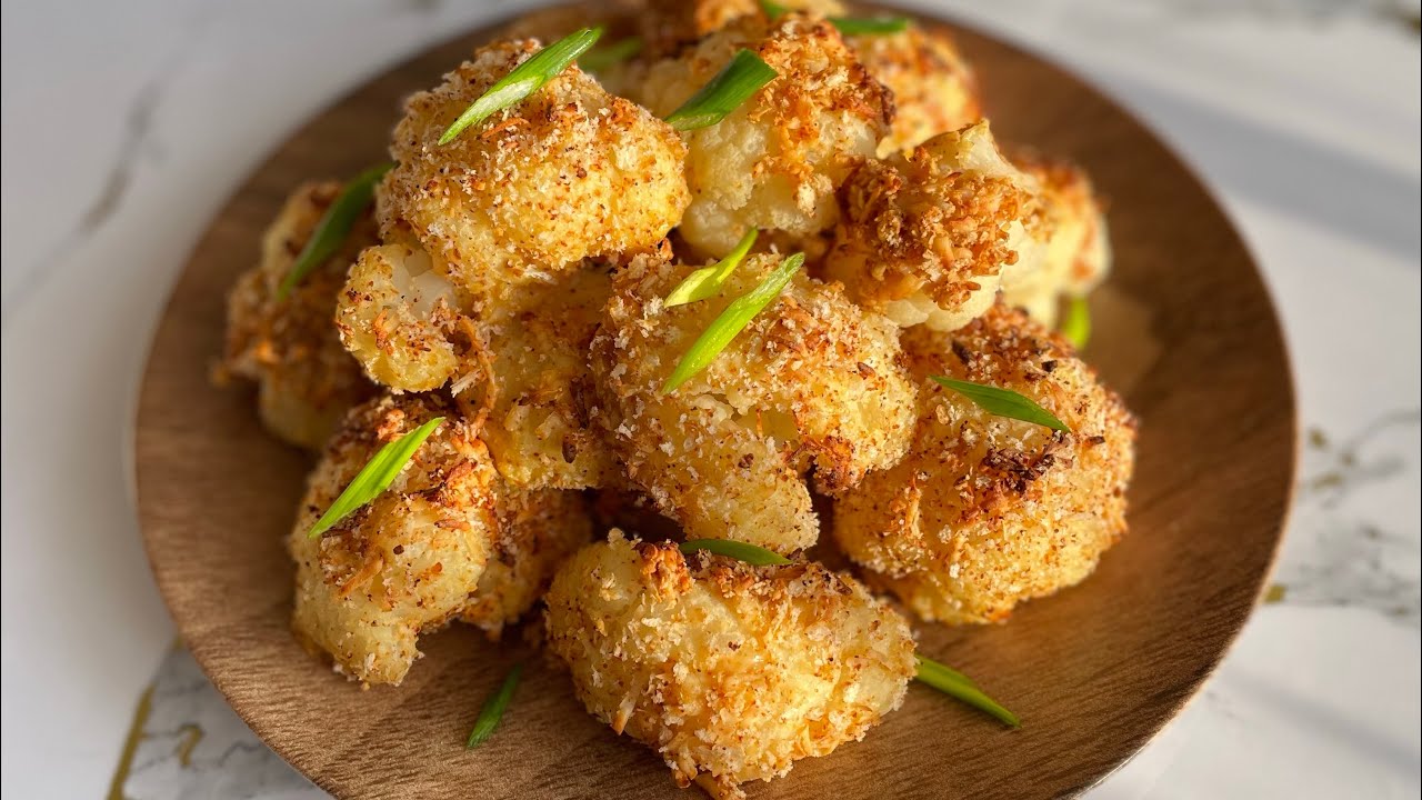 Nämä friteerattua kukkakaalia ja juustoa sisältävät pallot katoavat silmänräpäyksessä.